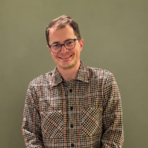 Headshot of Sam Agoos, LCSW