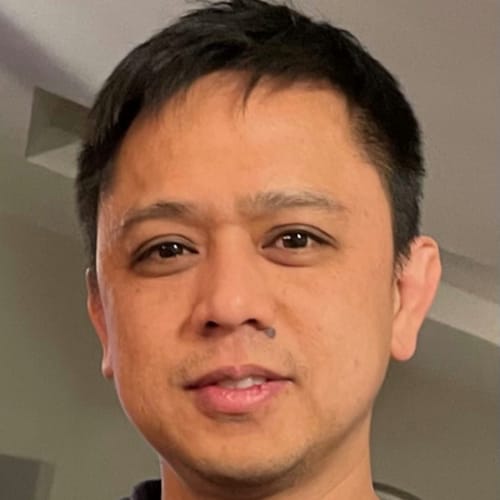 Headshot of Amando Esguerra, LPC