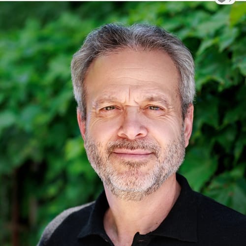 Headshot of Claudio Altman, CP