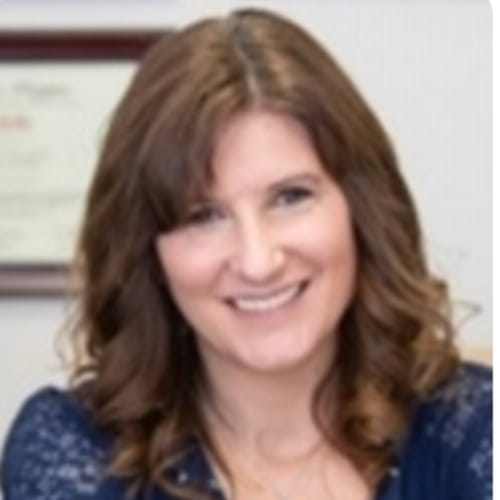 Headshot of Laura Stallbaumer, LSCSW