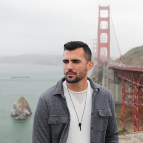 Headshot of Renato Talhadas, LMFT