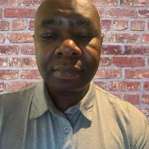 Headshot of Tarsicio Gacheru, APRN_CNP