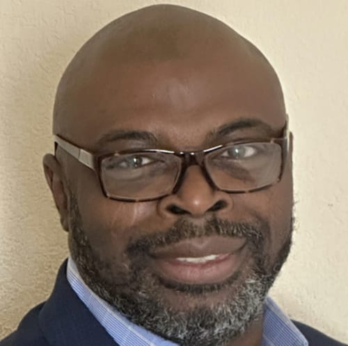 Headshot of Osayande Alfred-Iyamu, APRN