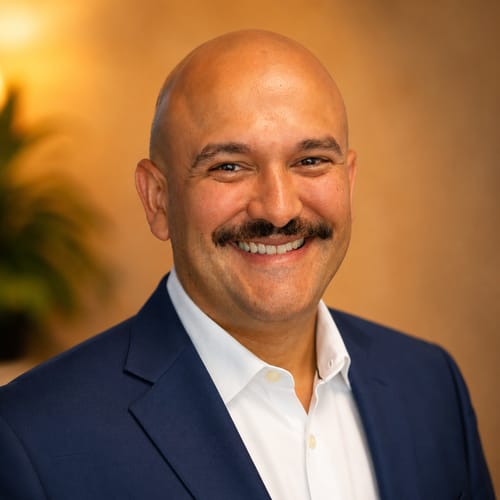 Headshot of Miguel A. Perez, LMHC