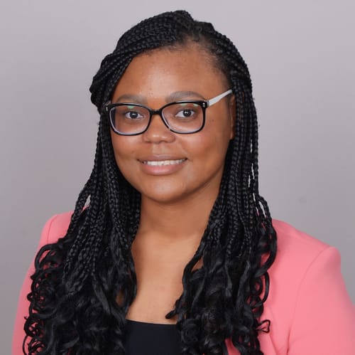 Headshot of Esther Mutombo, LPC