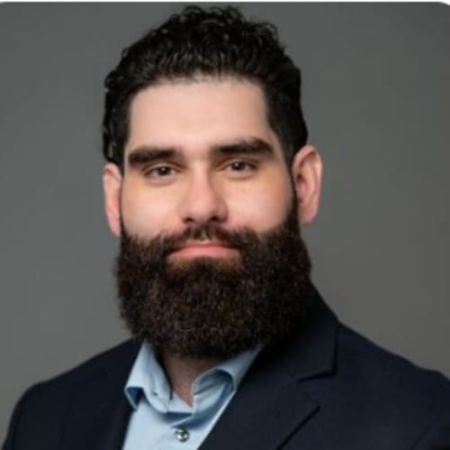 Headshot of Christian Santos, LMHC