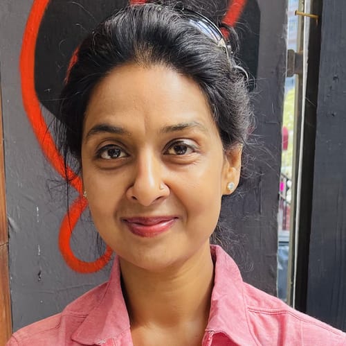 Headshot of Asha Vardarajan, CP