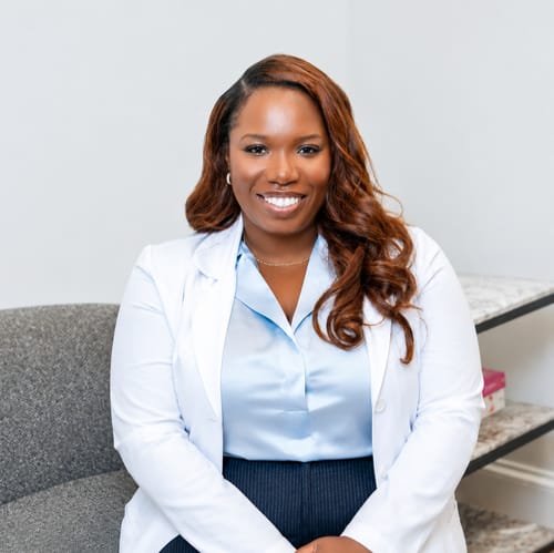 Headshot of Joy Bello, APRN