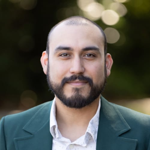 Headshot of Evan Reyna, LMHC