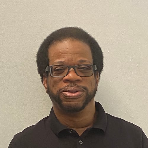 Headshot of Malcolm Thomas, LMHC