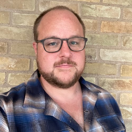 Headshot of Garrett Lathan, LPC