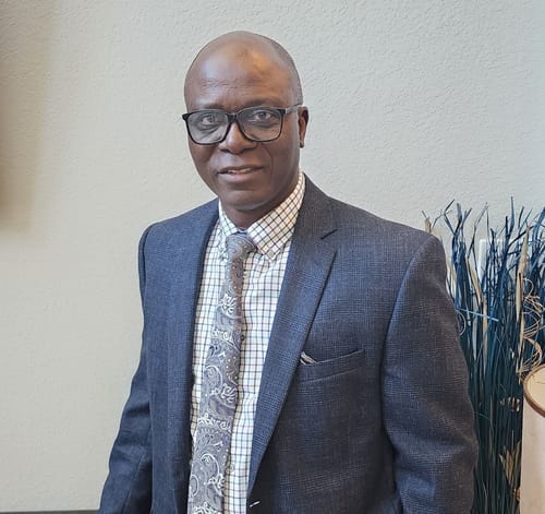 Headshot of Rauf Emiola, APN