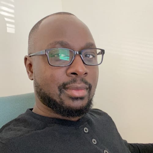 Headshot of Stanley Okeyemi, APRN