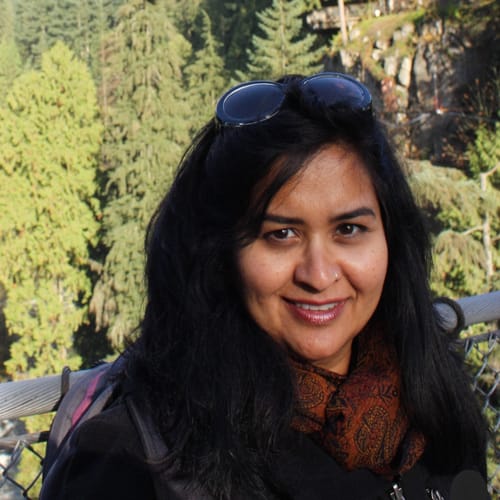 Headshot of Leema Khan, LMHC