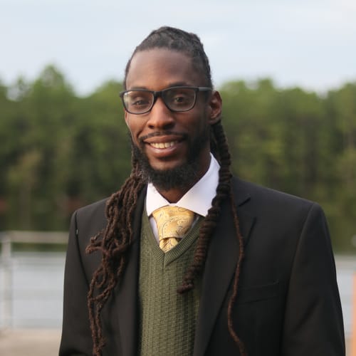 Headshot of Reylius Thompson, LMHC