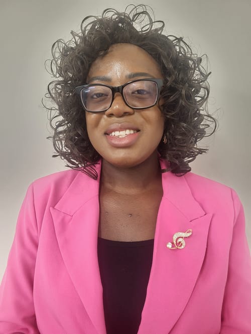 Headshot of Toyin Obajinmi, LPC