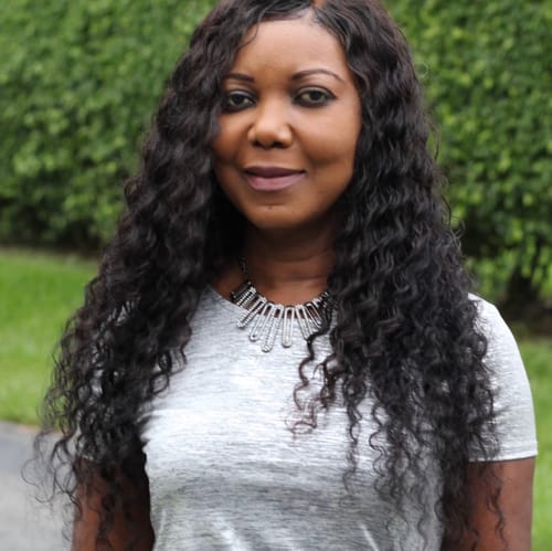 Headshot of Guylaine Dunac, APRN