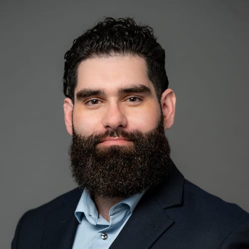 Headshot of Christian Santos, LMHC