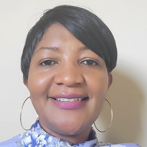 Headshot of Eveline Gwaabe, APRN