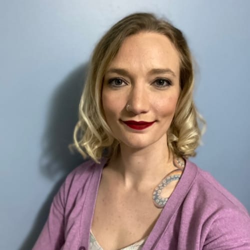 Headshot of Kelli Means, LPC