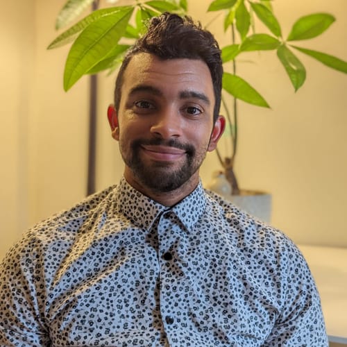 Headshot of Liam Amoroso, LMHC