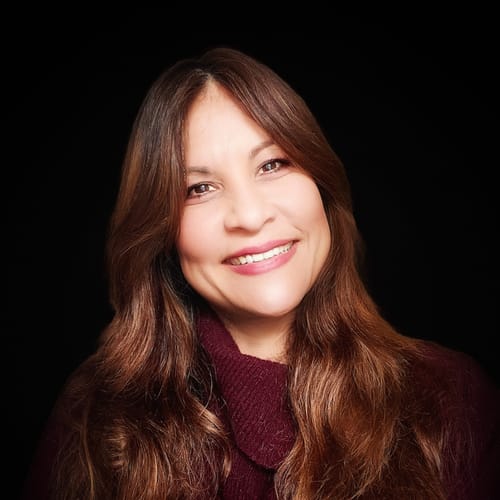 Headshot of Andreina Bello, LMHC