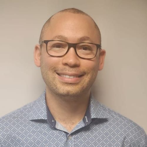 Headshot of Anthony Dewar, NP