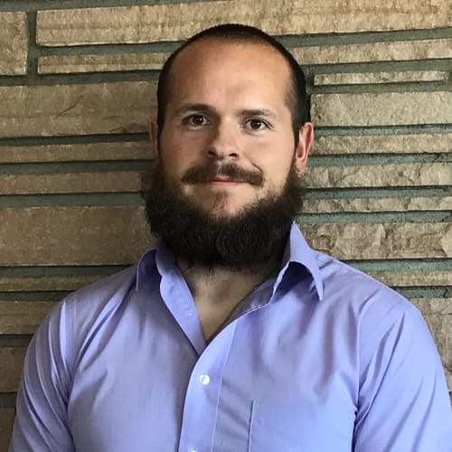 Headshot of Evan Powers, LPC