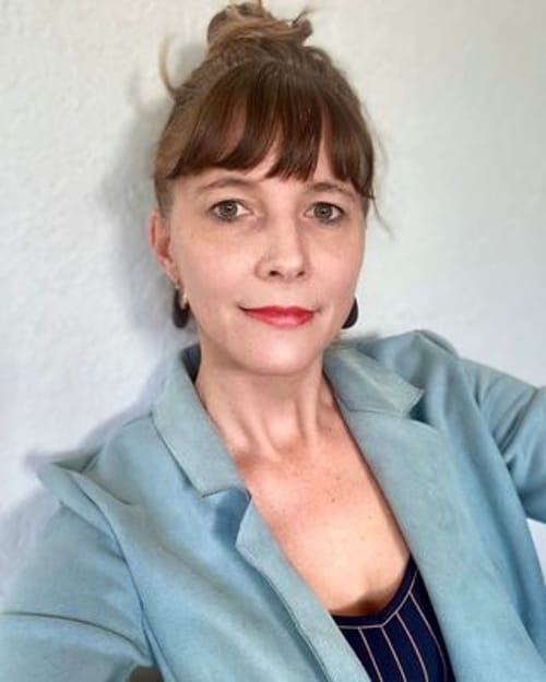 Headshot of Melanie Ryan, LMHC