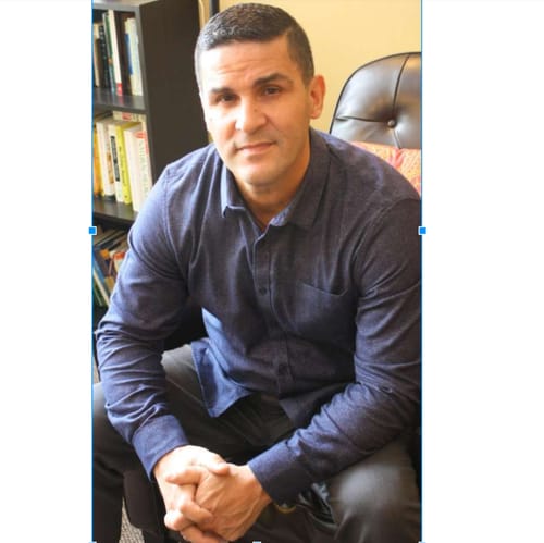 Headshot of Edwin Caraballo, LCSW
