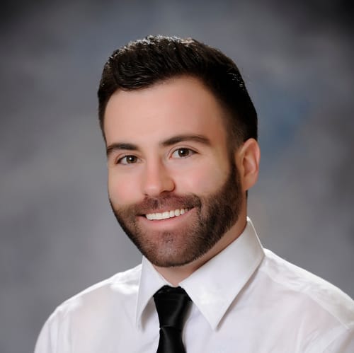 Headshot of Elliott O'Melia, NP