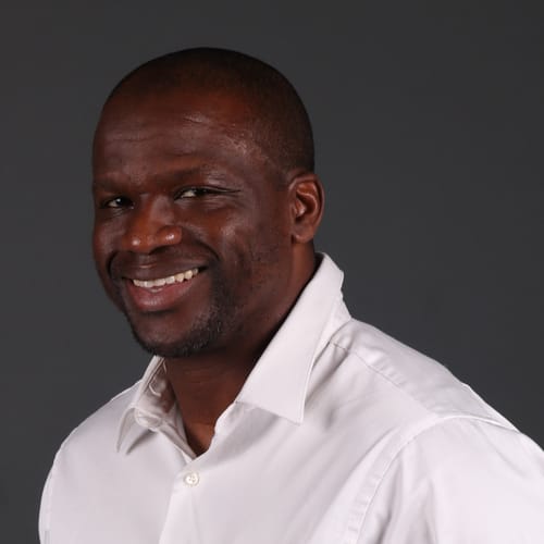 Headshot of Ugo Uche, LPC