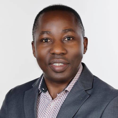 Headshot of Moses Oluga, APRN