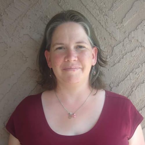 Headshot of Kathi-Ann Busha, CMHC