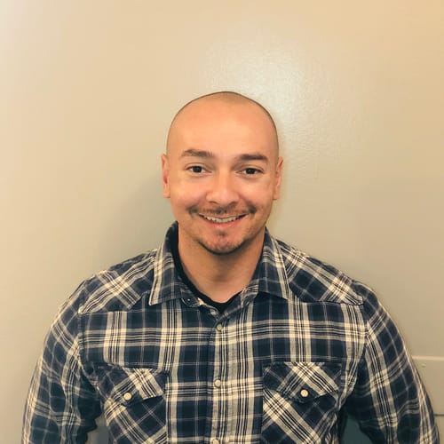 Headshot of Amon Benavides, LMFT