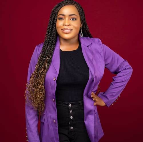 Headshot of Esther Alasa, LPC