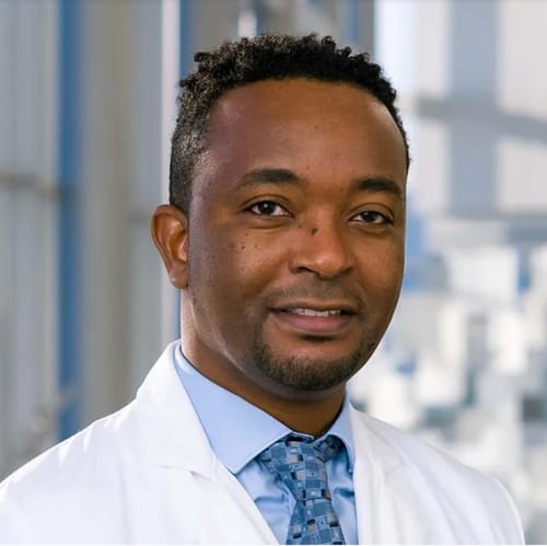 Headshot of John Muturi, APN