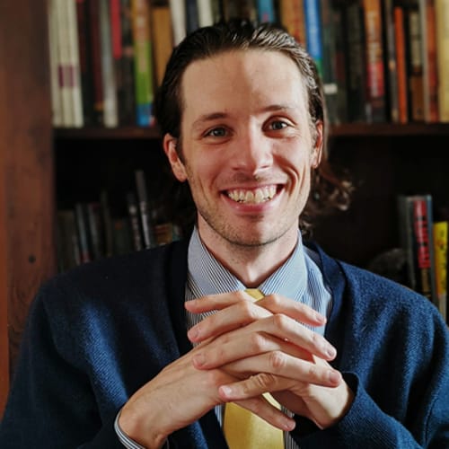 Headshot of Ezra Smith, PSYCHOLOGIST