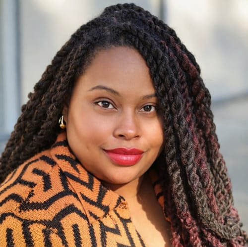 Headshot of Amani Shalom Wellness, LMFT