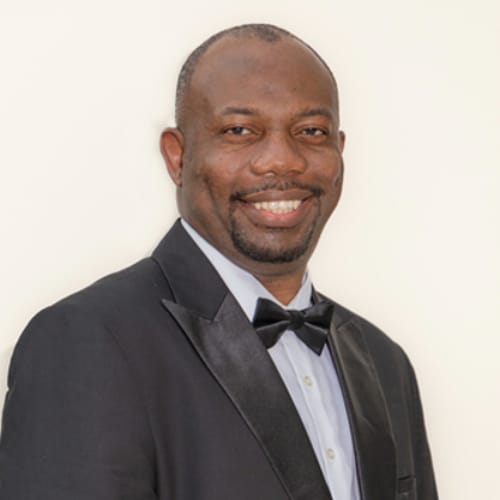 Headshot of Olushola Balogun, APN