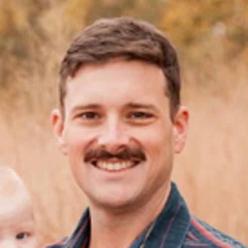 Headshot of Justin Gibbons, LPC