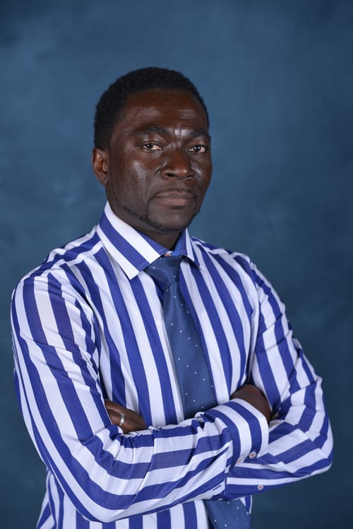Headshot of Patrick Olowoporoku, APN