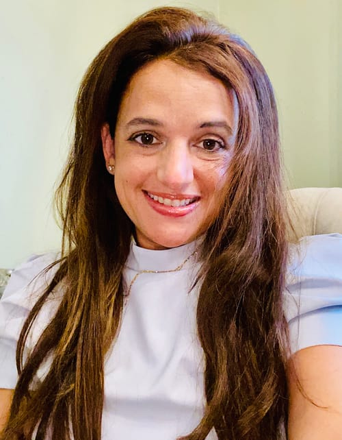 Headshot of Reina Baez, LMFT