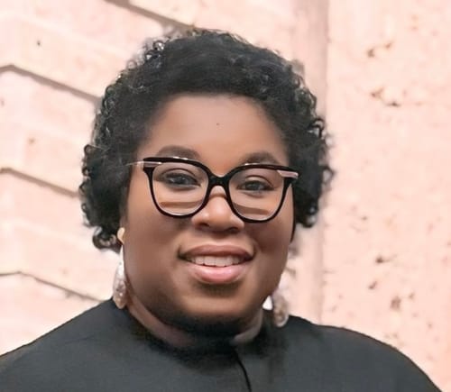 Headshot of Regina Olashege, NP