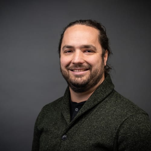 Headshot of Johnmark Mangiameli, LICSW